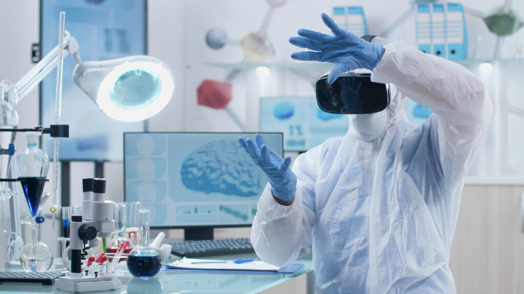 Scientist in protective suit using virtual reality headset in a high-tech laboratory.