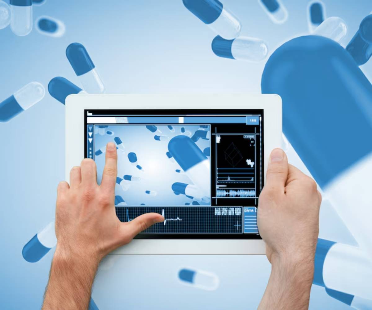 Hands interacting with a digital tablet displaying medical imagery, surrounded by floating pills in a blue background.