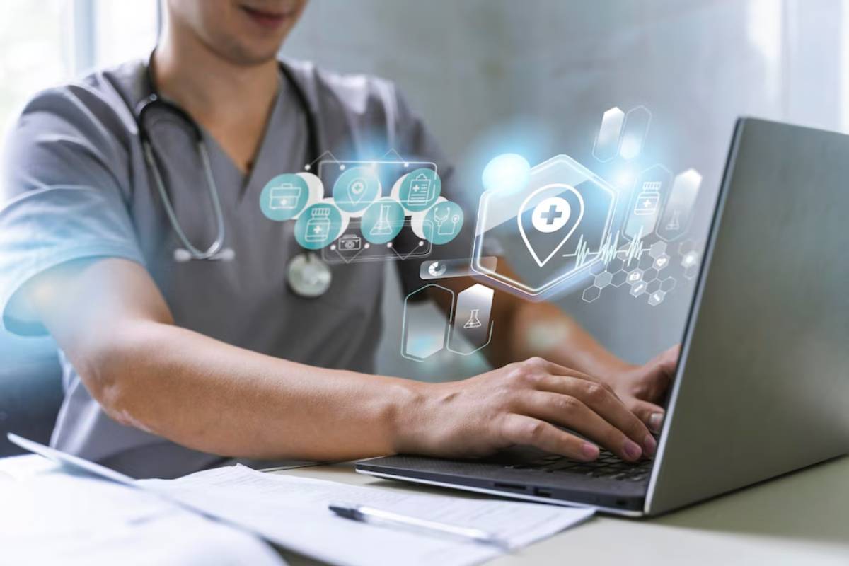 A healthcare professional using a laptop, displaying futuristic digital healthcare and medical icons.